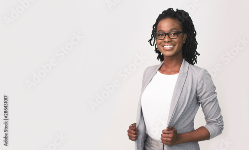 African American Business Girl Smiling At Camera, Studio Shot
