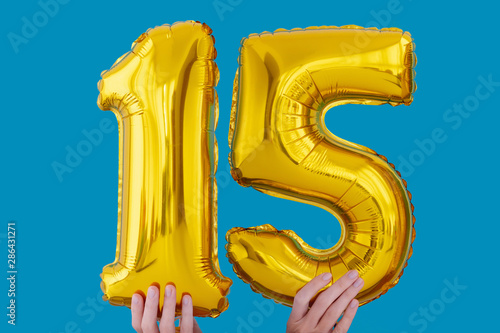 Gold foil number 15 celebration balloon photo