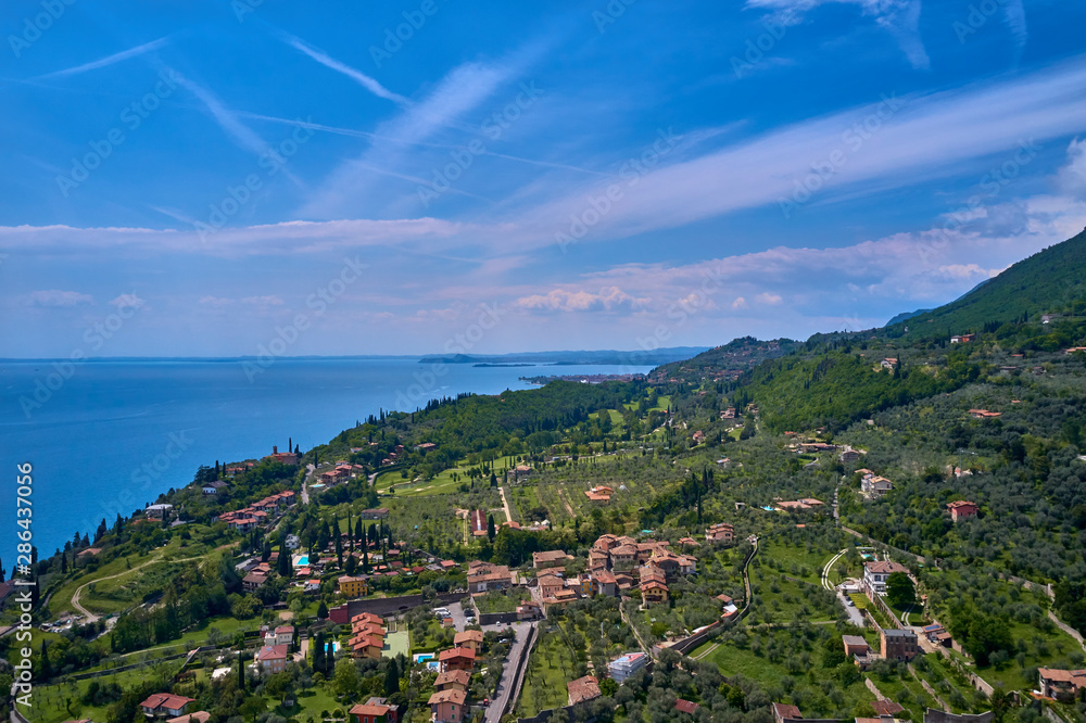 Aerial photography with drone. Italian town Gargnano on Lake Garda, Italy.