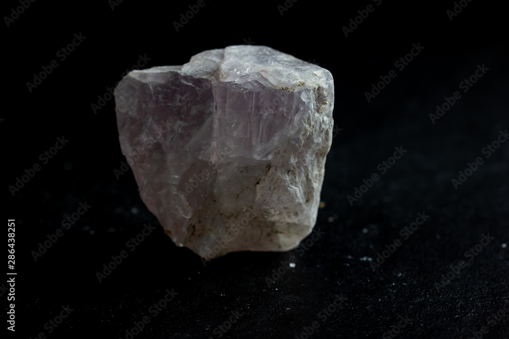 fluorite stone mineral crystal sample for science and geology isolate on black background