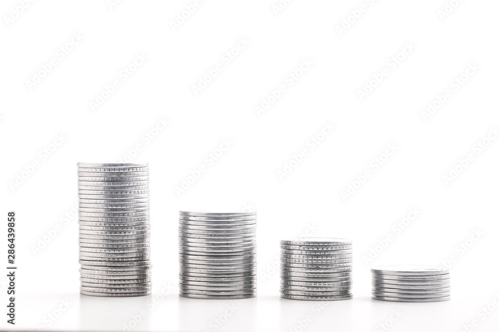 Stack of indian currency in coins arranged as a graph on white background Stack of indian currency in coins arranged as a graph on white background