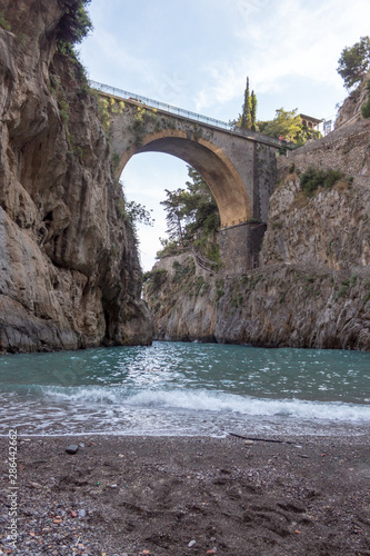 bridge in the rocks on the amalfi coast in italy