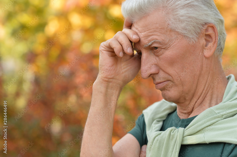 Close up portrait of senior man outdoors