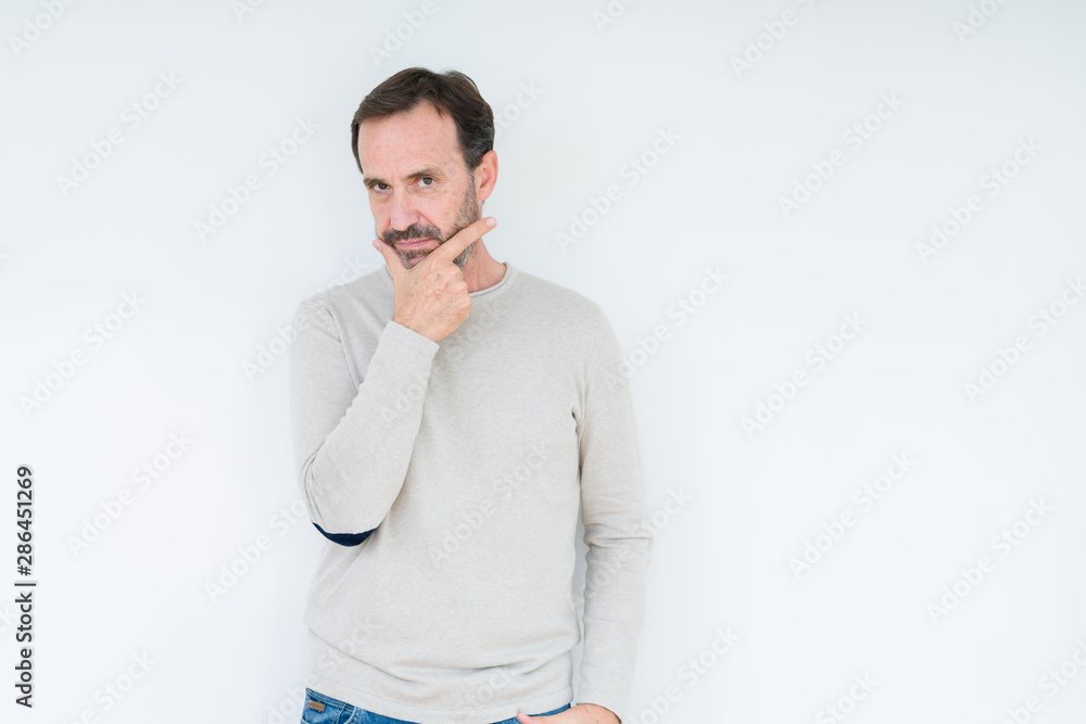Elegant senior man over isolated background looking confident at the camera with smile with crossed arms and hand raised on chin. Thinking positive. Elegant senior man over isolated background looking confident at the camera with smile with crossed arms and hand raised on chin. Thinking positive.