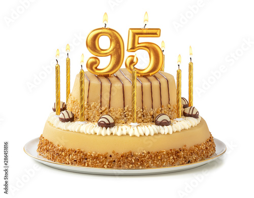 Festliche Torte mit goldenen Kerzen - Nummer 95