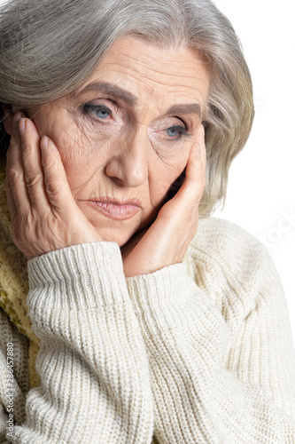 Close up portrait of sad senior woman