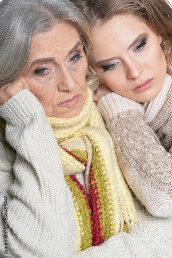 Close up portrait of senior mother and her daughter Close up portrait of senior mother and her daughter