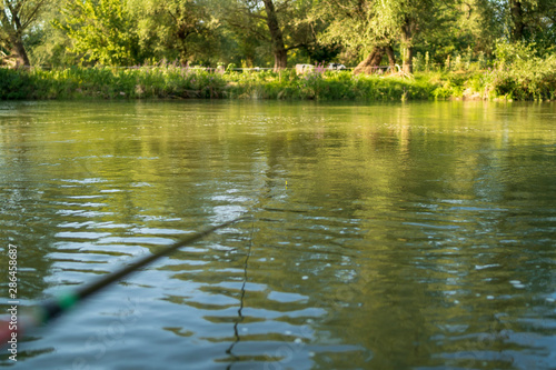 Fototapeta Naklejka Na Ścianę i Meble -  fishing float in a river