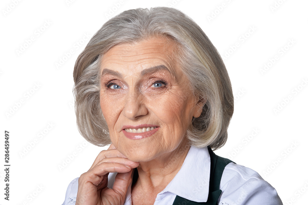 Close up portrait of happy senior woman posing