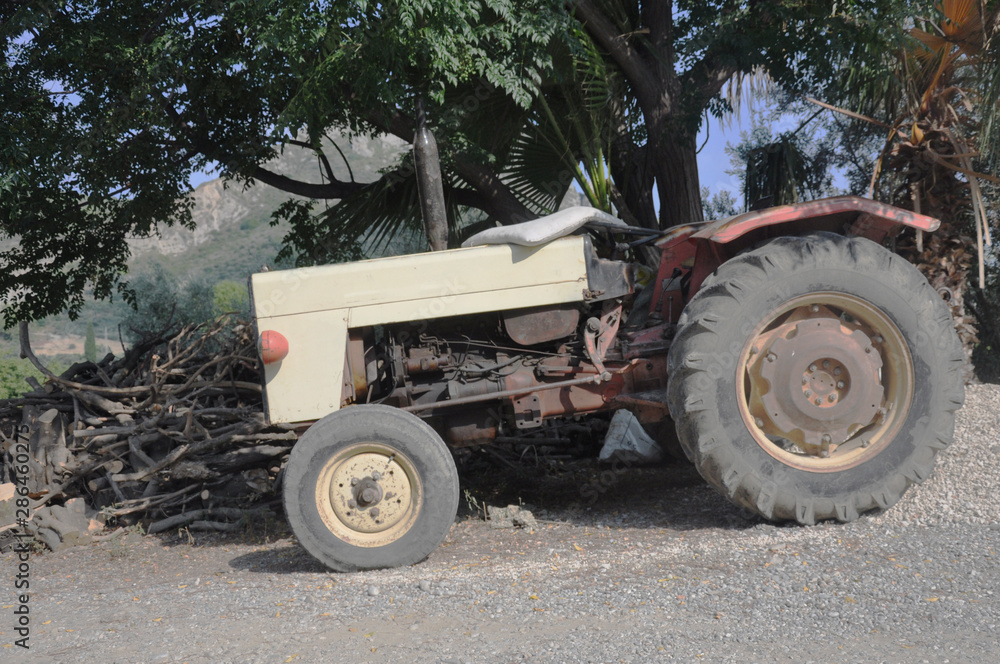 An old tractor used for cultivating land in hot countries. An old tractor used for cultivating land in hot countries.