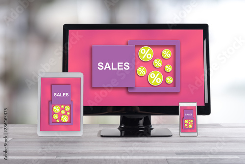 Sales and discounts concept on different devices