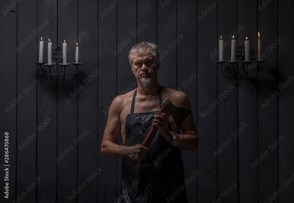 portrait of a ripper butcher on a black background
