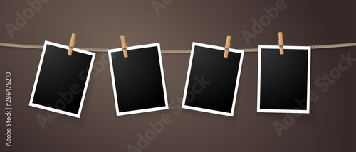 Realistic detailed photo icon design template. Photo frames hanging on the rope with clothespin