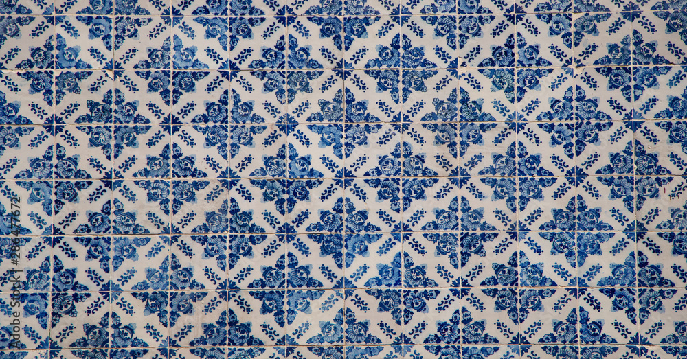 Traditional tiles on the facade of an old house in Porto, Portugal