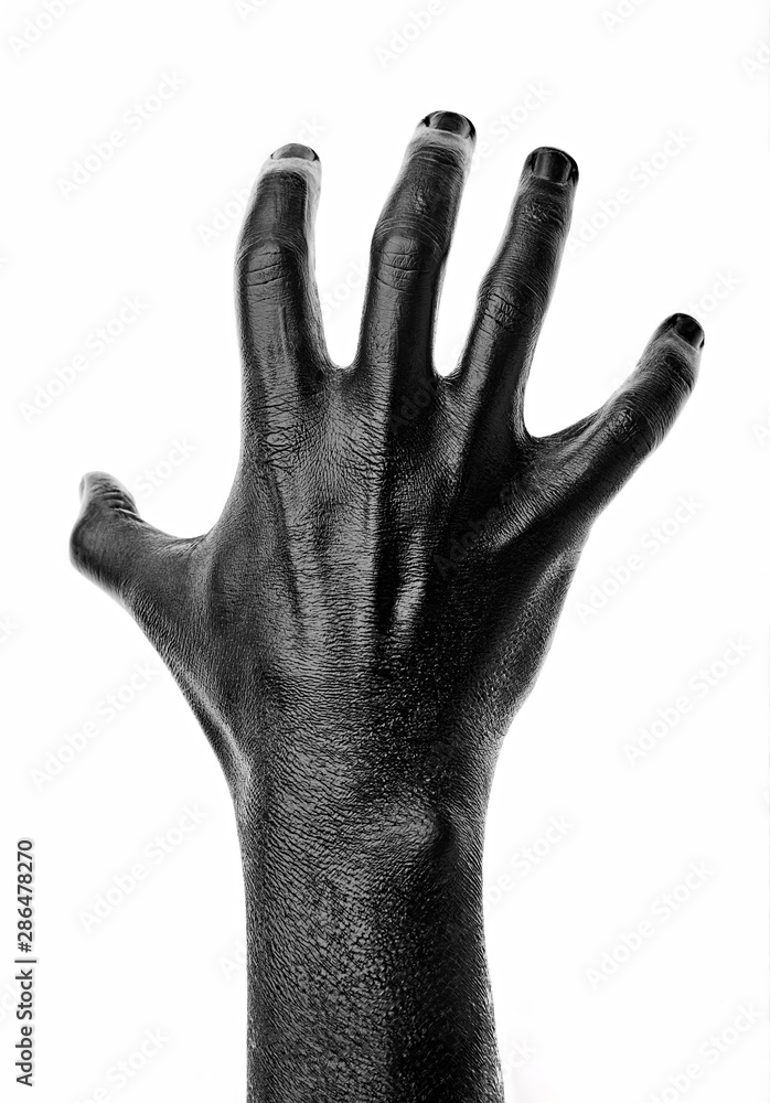 Black hand on white background, isolated, paint. ..Male hand isolated ...