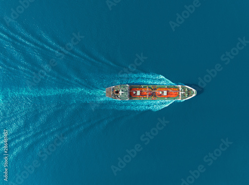 Aerial top view Oil ship tanker carier oil from refinery on the sea. photo