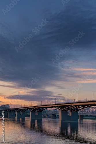 Bridge over the Yenisei river evening sunset. Krasnoyarsk, Russia. vertical © Vladimir Razgulyaev