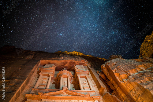 Petra treasury by night lighten by candles and galaxy photo