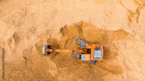 Aerial view excavator working on a construction site.