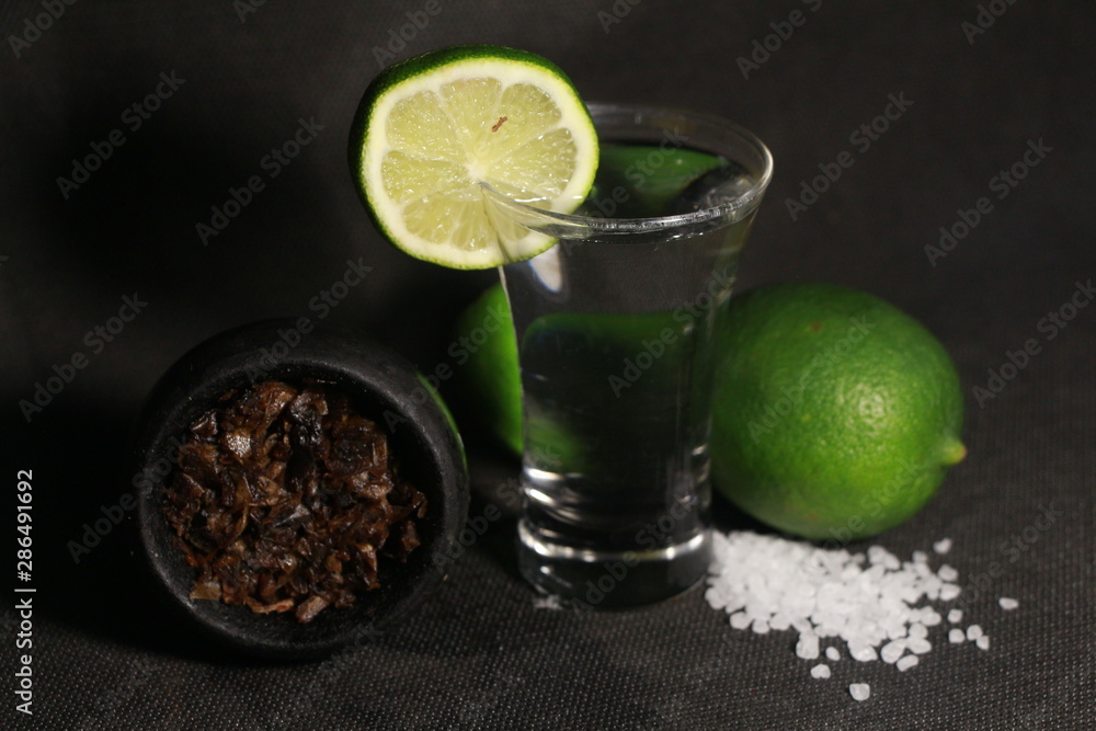 Fototapeta premium bowl with hookah tobacco. berries on a black background. sheesha smoking