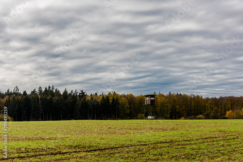 Panorama view in the autumnal nature. With fields trees and quiet nature.