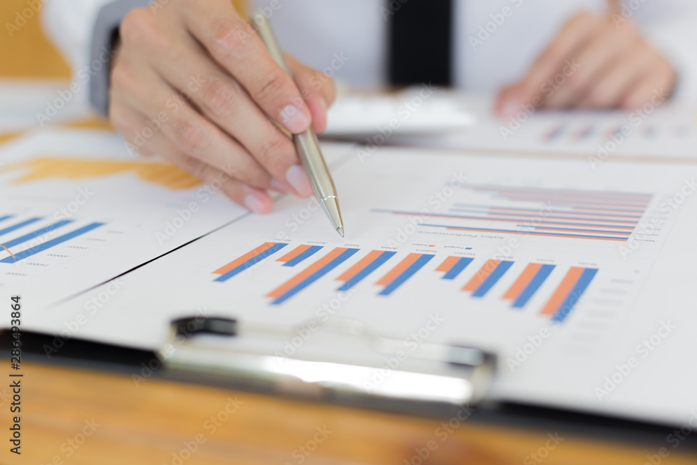 Financial and investment planning, Head of Marketing is analyzing data from the summary graph statistics for executives, business meetings. Financial and investment planning, Head of Marketing is analyzing data from the summary graph statistics for executives, business meetings.