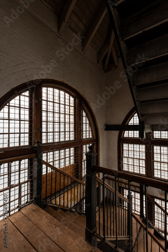 Derelict Historic Staircase with Large Windows - Abandoned Tewksbury State Hospital - Massachusetts