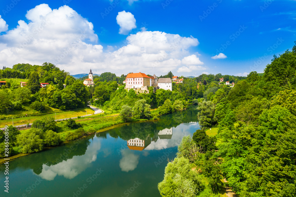 Beautiful old castle of Ozalj, aerial drone view of the river Kupa in the town of Ozalj, Croatia