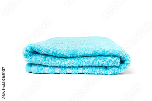 Blue towel isolated on white background.