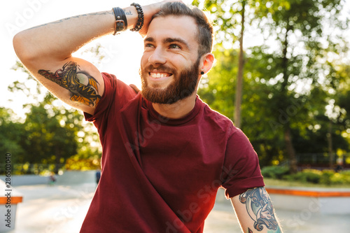 Handsome young man dressed in casual clothing photo