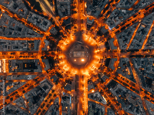 Aerial of the Arc de Triomphe in Paris, France at night