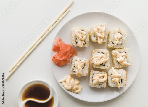 View from above sushi plate with sauce