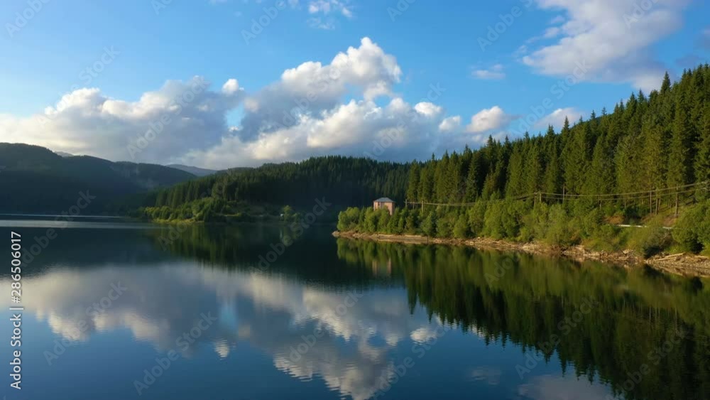 evening lake aerial panorama with the beautiful reflections and pine forest coastline evening lake aerial panorama with the beautiful reflections and pine forest coastline