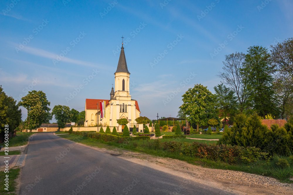 Church in Pieczyska on a sunny day, Masovia, Poland