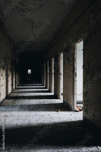 Derelict Empty Hallway with Open Doors - Abandoned Central Islip State Hospital - New York