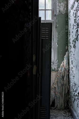 Derelict Open Locker + Curtains - Abandoned Central Islip State Hospital - New York © Sherman Cahal