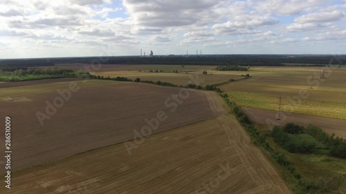 Factory Chimneys On The Horizon. Aerial photo