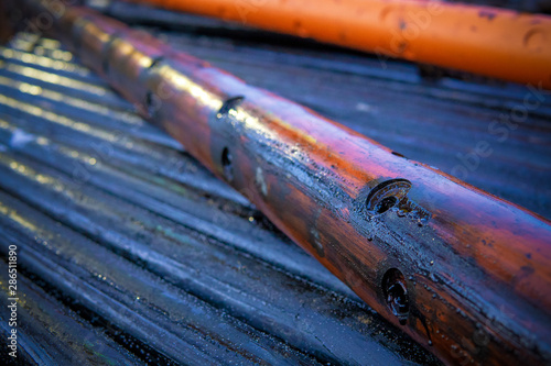 Perforation tool for perforate oil and gas well to make the hole on production tubing to allow gas and condensate flow, Oil and gas business. Perforating gun swelling after firing.