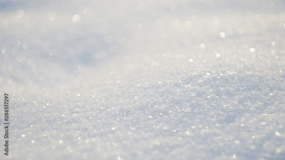 The surface of the sparkling fresh white snow. Frosty morning, free space for text. The surface of the sparkling fresh white snow. Frosty morning, free space for text.