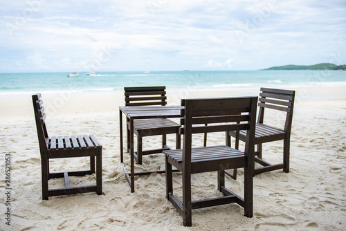 wooden table for restaurant on the beach © thawatpong