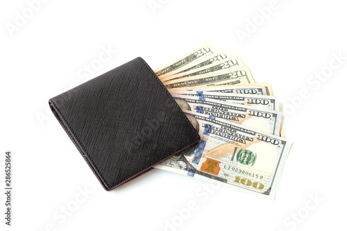 US dollar inside Wallet on white background.US dollar is main and popular currency of exchange in the world.Investment and saving concept.