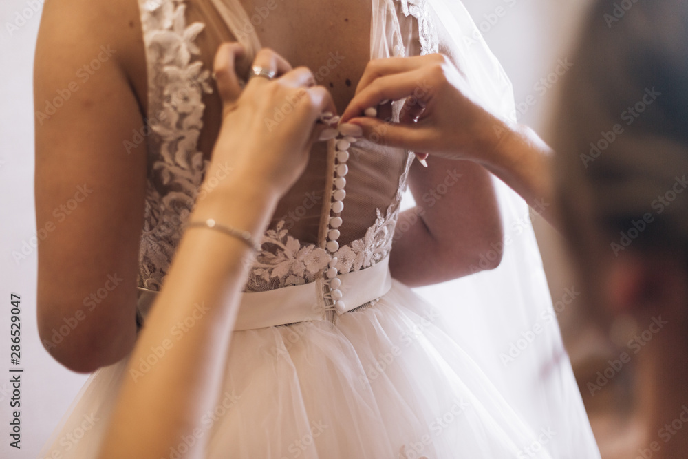 Wedding image and a bridal bouquet with red flowers	