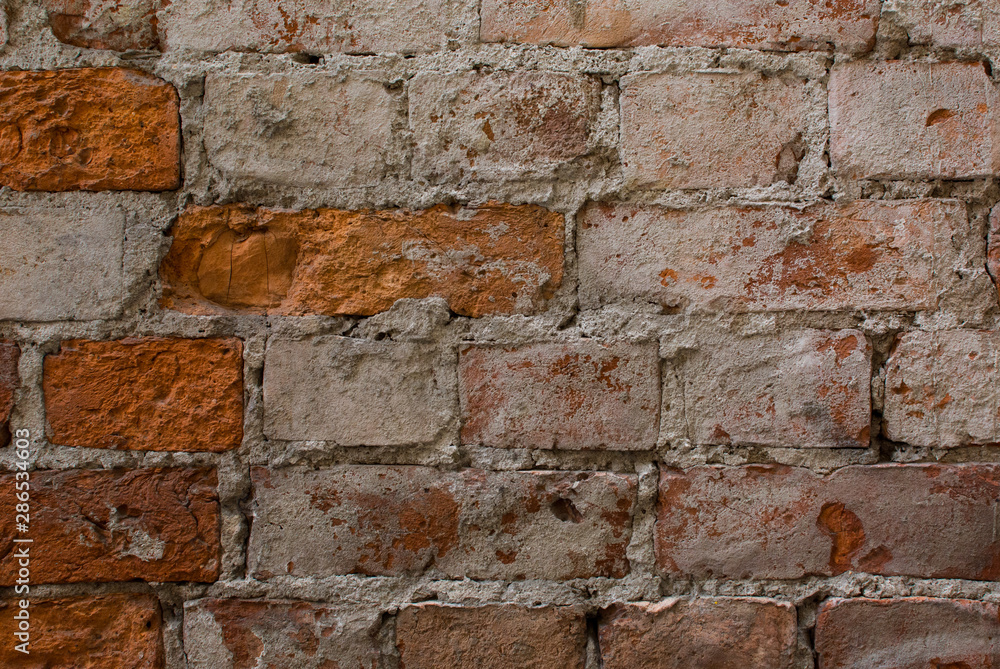 Brick wall. The texture of the building. Loft style background Brick wall. The texture of the building. Loft style background
