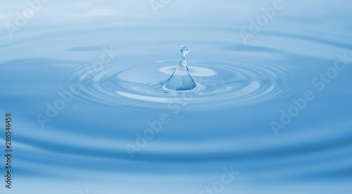 Splash of water with drops as background, closeup