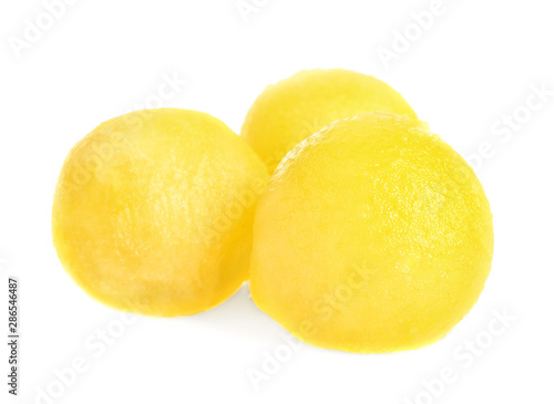 Juicy sweet melon balls on white background