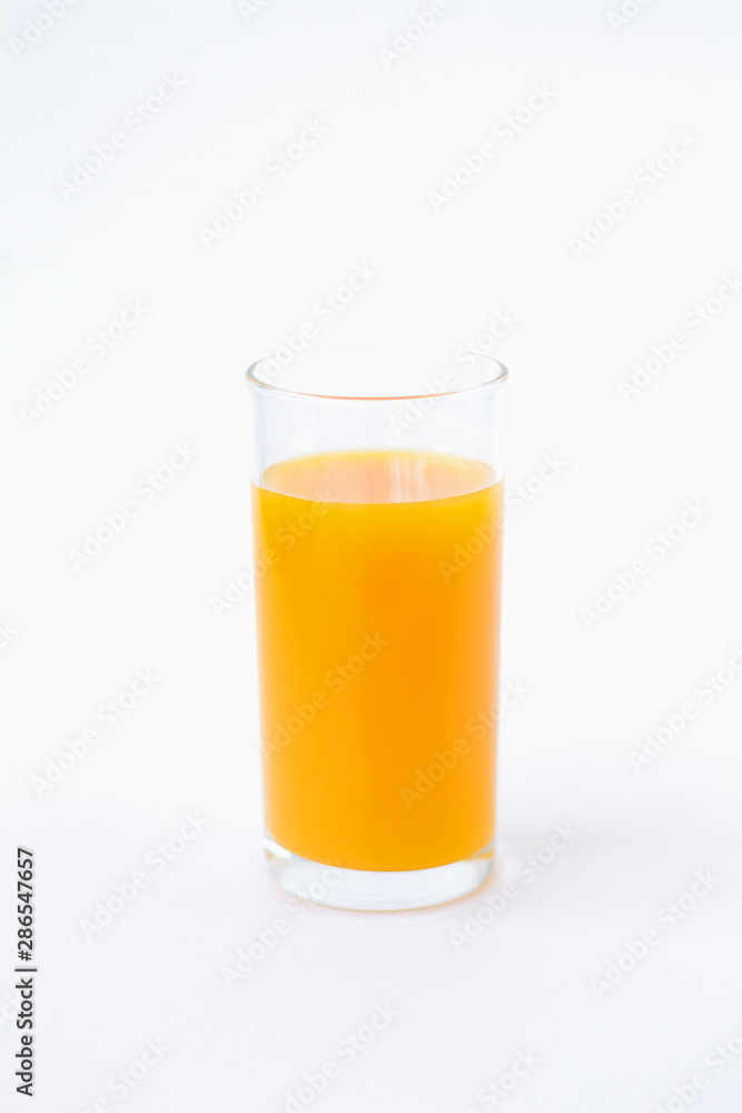 glass of juice isolated on white background glass of juice isolated on white background