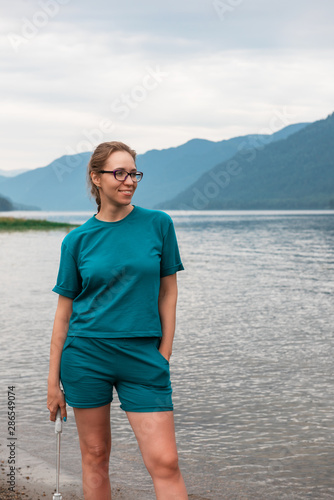 Woman on Teletskoye lake in...