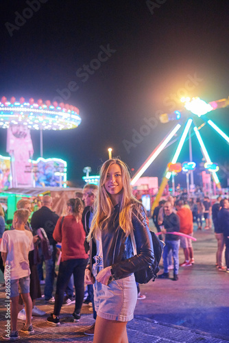 Young woman on an itinerant amusement park