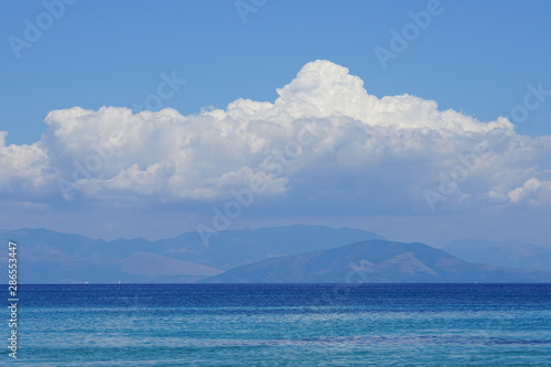 Beautiful panorama of the sea of Corfu with the mountains of Igoumenitsa in the background