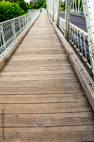 Wooden Sidwalk on a Bridge photo
